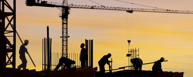 Men working on site at sunset 000002774936 670x270