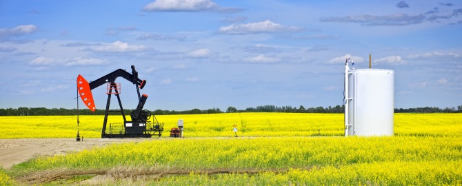 Oil pumpjack or nodding horse pumping unit in Saskatchewan prairies, Canada