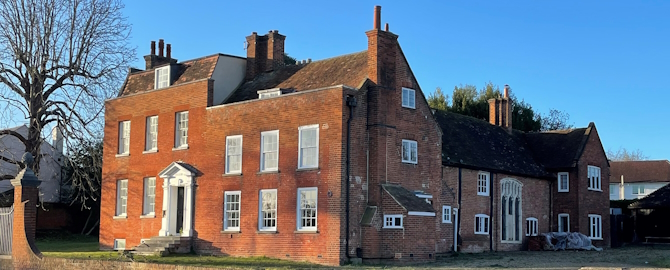 Cedar House Cobham in Sunshine 670x270